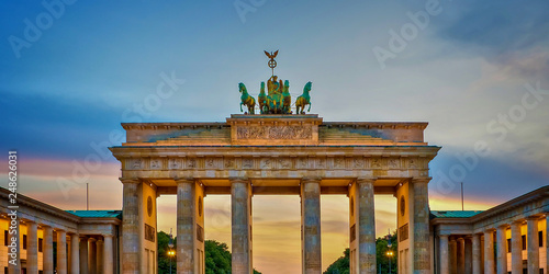 Brandenburg gate illuminated at sunset , Berlin, Germany