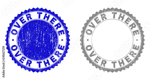 Grunge OVER THERE stamp seals isolated on a white background. Rosette seals with grunge texture in blue and grey colors. Vector rubber stamp imprint of OVER THERE label inside round rosette.