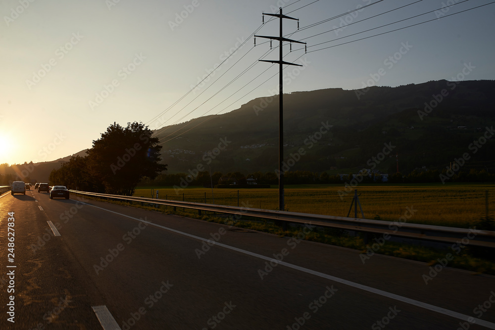 Electricity poles along the highway in the Swiss mountains
