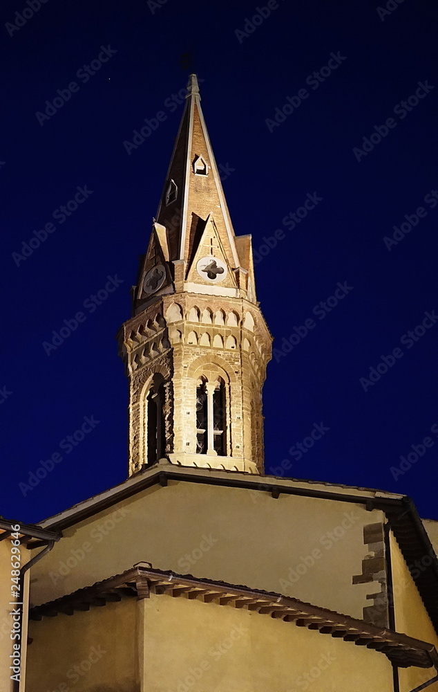 Bell tower of Badia Fiorentina at night, Florence, Italy