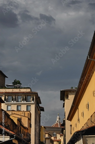 View of the cathedral dome from the Ponte Vecchio, Florence,Italy photo