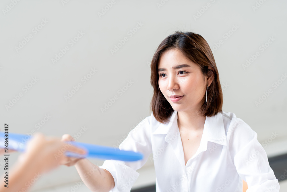 Happy business woman working in a office Happy business woman working in a office