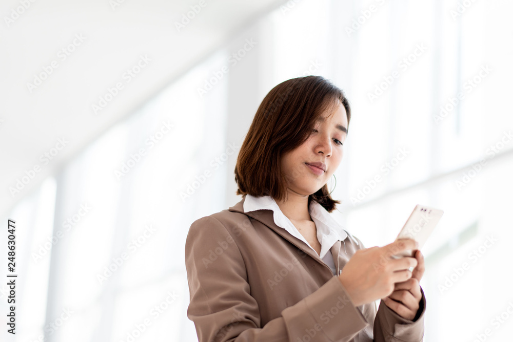 Business woman use a smartphone Business woman use a smartphone
