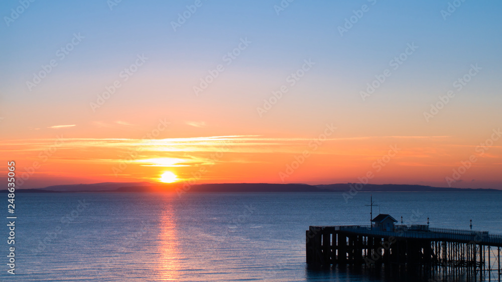 Beautiful Sunrise over the Sea and Penarth Pier, Wales, UK
