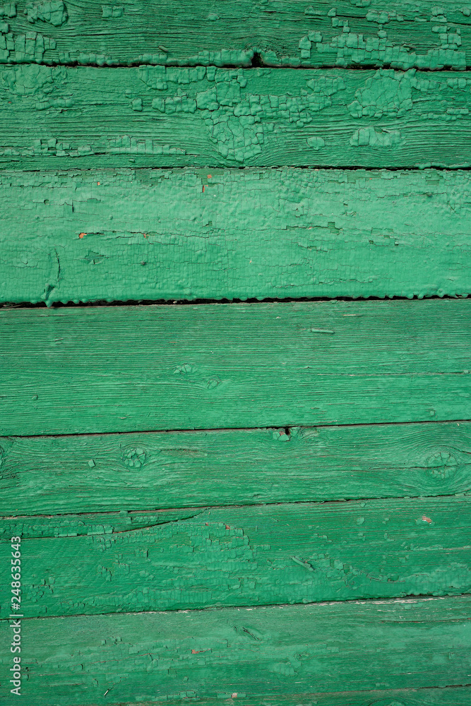 Rough wooden structure of old boards with different shades of color Rough wooden structure of old boards with different shades of color