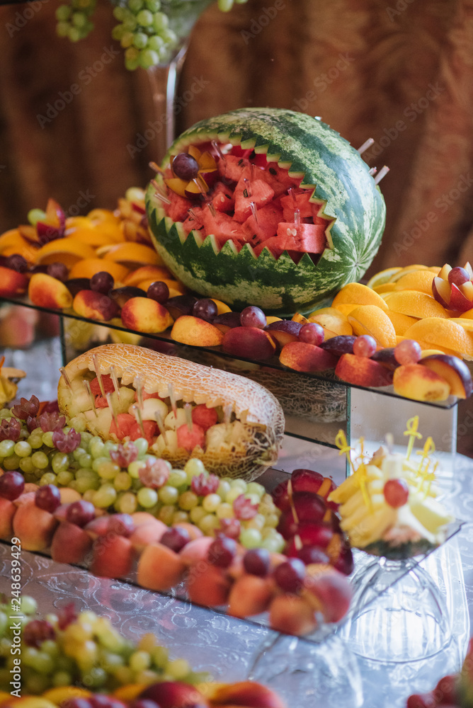 Wedding buffet table with different variety of fresh fruits
