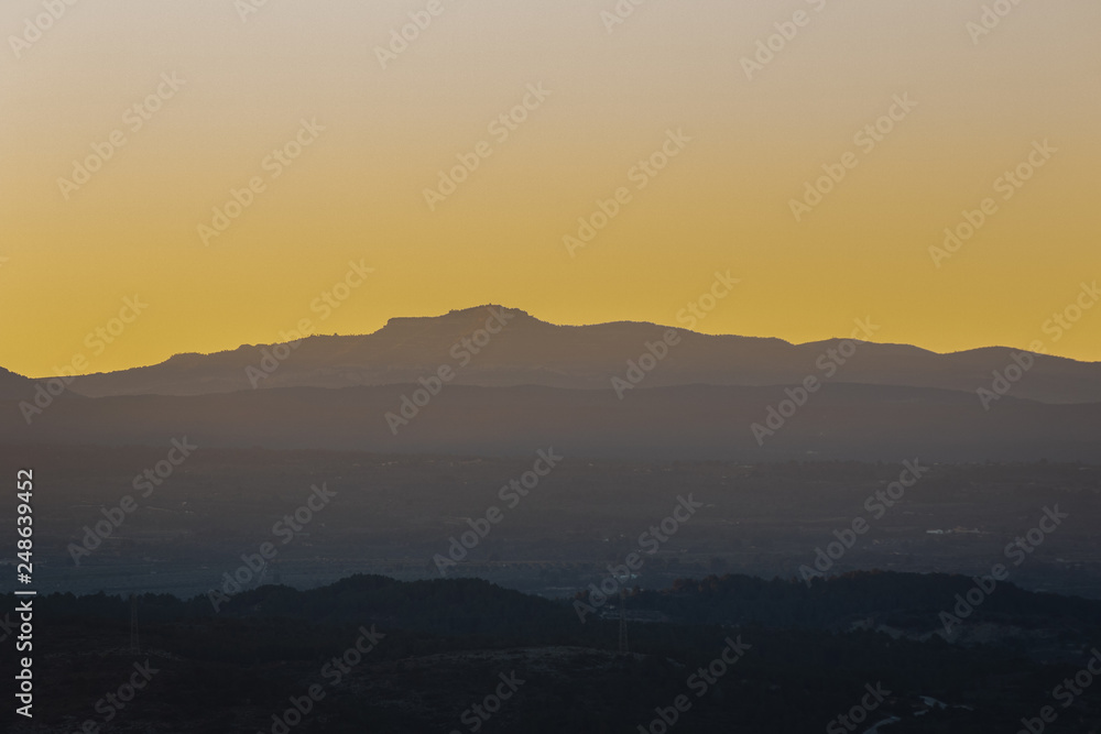 Spanish rural landscape of mountains and sunset
