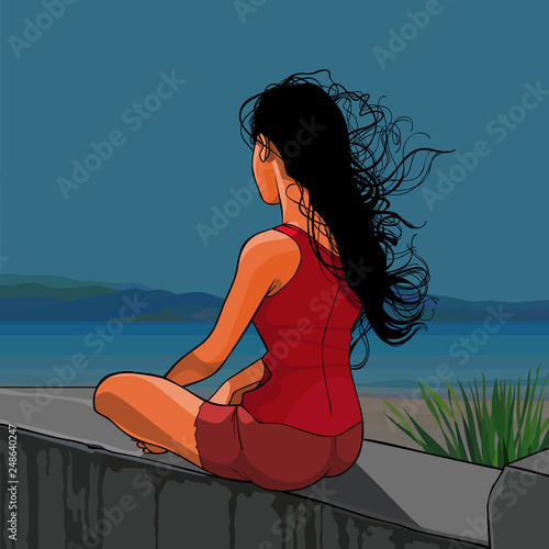 woman sits thoughtfully on the parapet by the sea