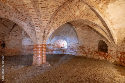 Old beautiful brick architecture with vaults and arches