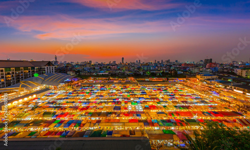 Photography Sunset over Bangkok city business downtown and train night market Ratchada