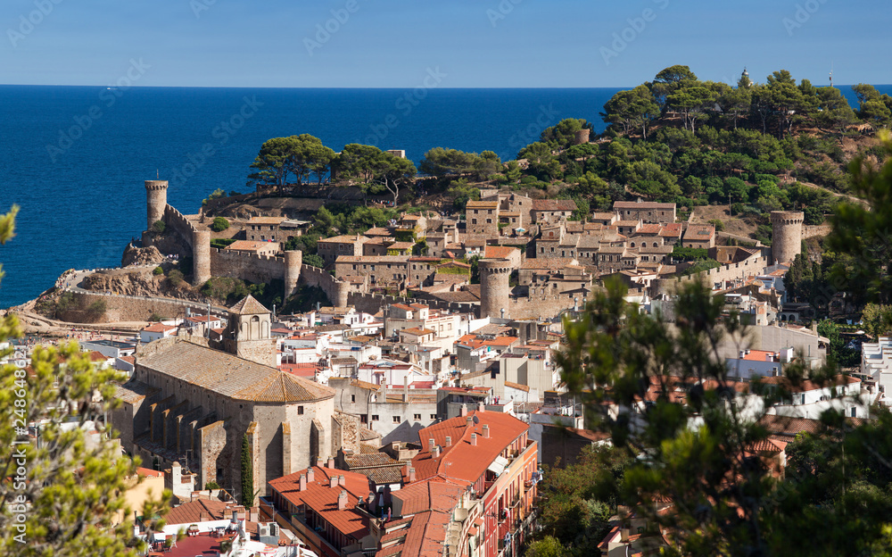 Panorama Tossa de mar, city on the Costa Brava. City walls and medieval castle on the hill. Amazing city in Girona, architecture and monuments of Catalonia, Spain.