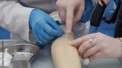 training injection into a vein on a mannequin photo