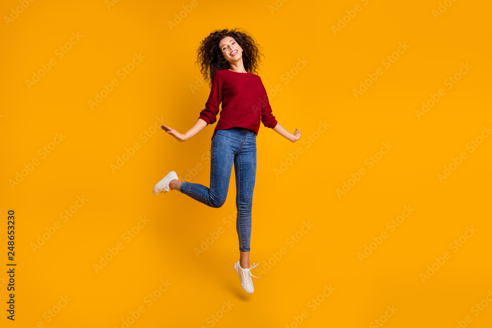 Full length body size view of her she nice attractive cheerful cheery glad funny free slim thin fit wavy-haired lady good day daydream easy walk isolated on bright vivid shine orange background