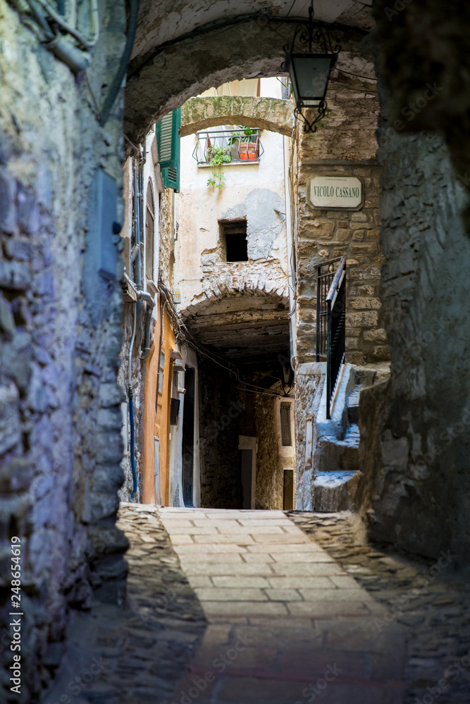 Narrow cobbled streets of Italian old town Perinaldo. Medieval Architecture of Liguria, Italy