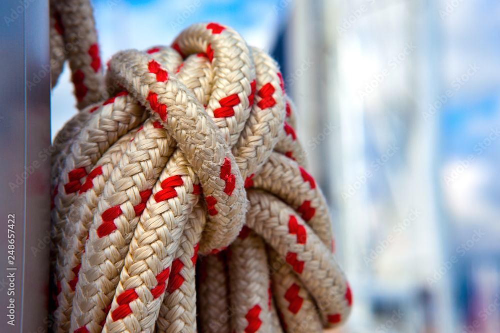 sailing ropes on a yacht close-up. line used to control the angle of ...