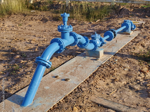 Vászonkép Water supply pipeline steel blue