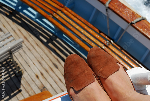 Woman shoes during a boat trip photo