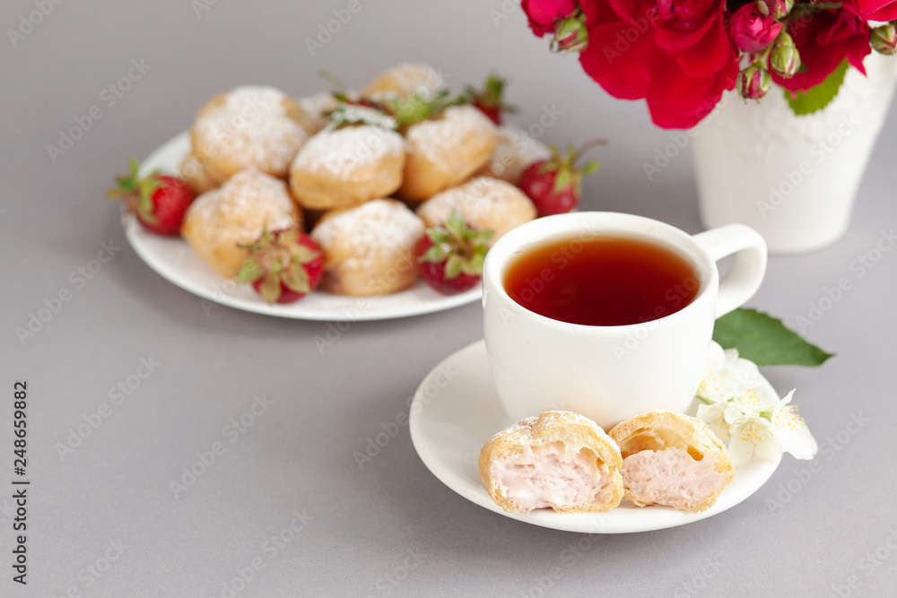 Food concept. Home made cake eclairs. Traditional eclairs, profitroles classic, eclairs french. Background to Valentine's day, festive tea party. Food concept. Home made cake eclairs. Traditional eclairs, profitroles classic, eclairs french. Background to Valentine's day, festive tea party.
