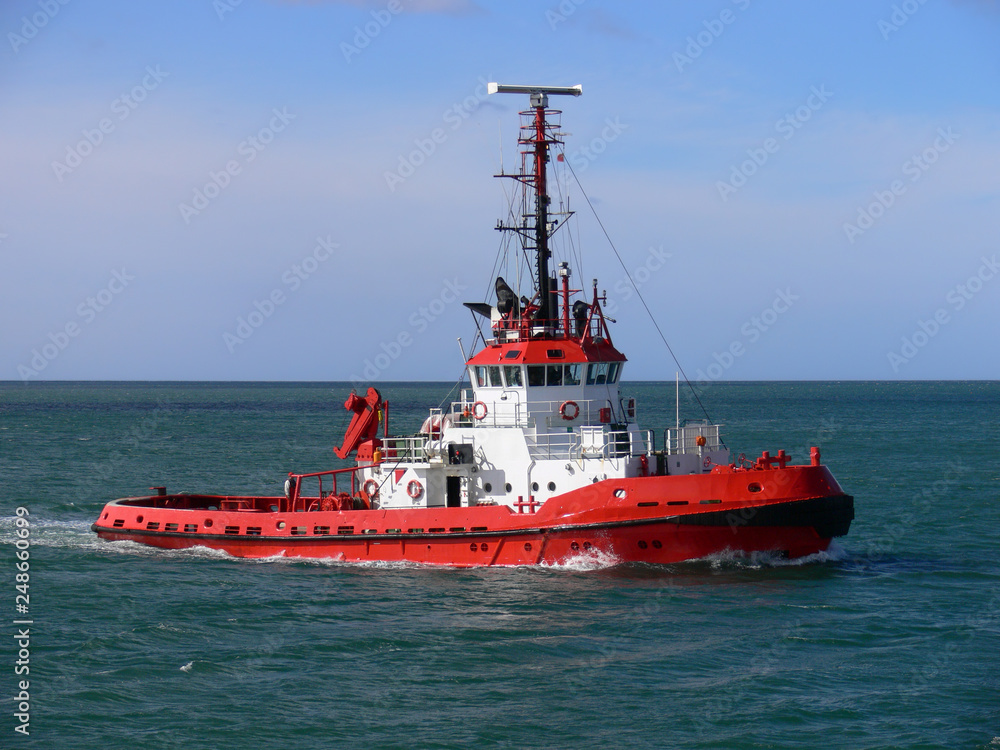 Tugboat underway at sea to towage job location. Tugboat underway at sea to towage job location.