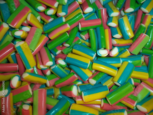 a bunch of multi-colored striped candies