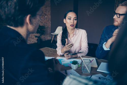 Nice chic elegant attractive beautiful clever smart cheerful business sharks experts glamorous lady negotiation interview recruiter at modern industrial loft interior work place station photo