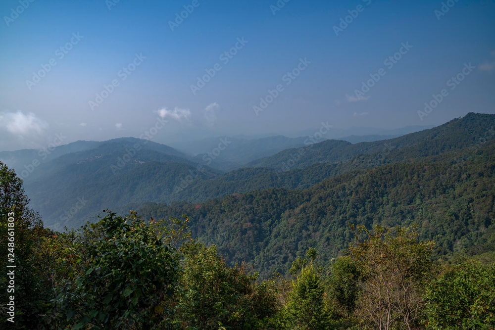 Naklejka premium Green forest hills panoramic top view, Chiang Rai, Thailand