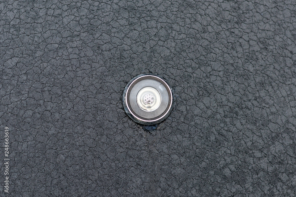 steel door. view from the street. peephole from the temperature drop is all in the bubbles. steel door. view from the street. peephole from the temperature drop is all in the bubbles.