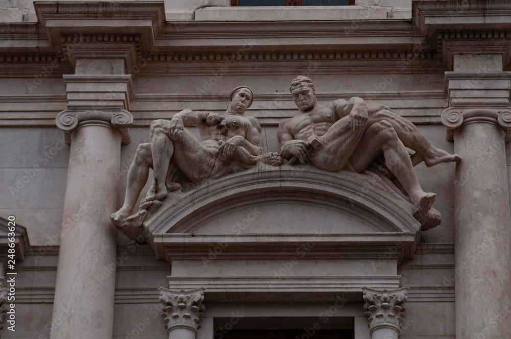 Eighth marble trabeation of the Palazzo Nuovo, Mai library in Bergamo, Italy. Detail of the ornamental marble statues, works by Tobia Vescovi.