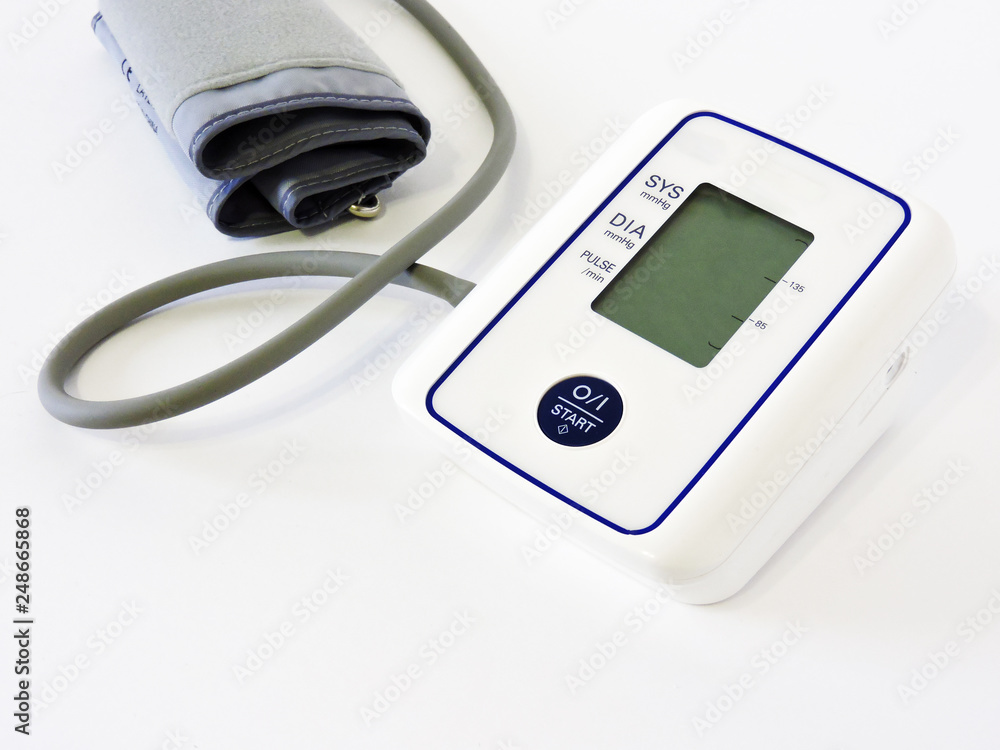 Digital Blood Pressure Monitor on white background. Close-up.Health and Medical concept .Cardiology. Tonometer and a manometer, stethoscope for diagnosis to measure of blood pressure and pulse. Digital Blood Pressure Monitor on white background. Close-up.Health and Medical concept .Cardiology. Tonometer and a manometer, stethoscope for diagnosis to measure of blood pressure and pulse.