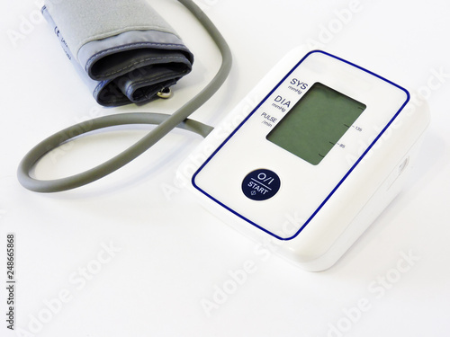 Digital Blood Pressure Monitor on white background. Close-up.Health and Medical concept .Cardiology. Tonometer and a manometer, stethoscope for diagnosis to measure of blood pressure and pulse.