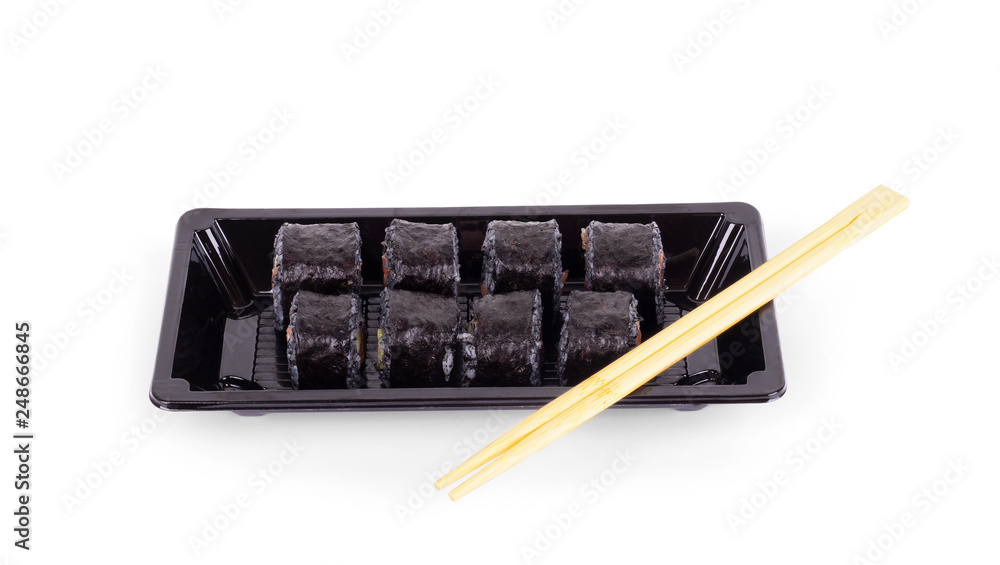 Take-away sushi in a plastic container with chopsticks on a white background Take-away sushi in a plastic container with chopsticks on a white background