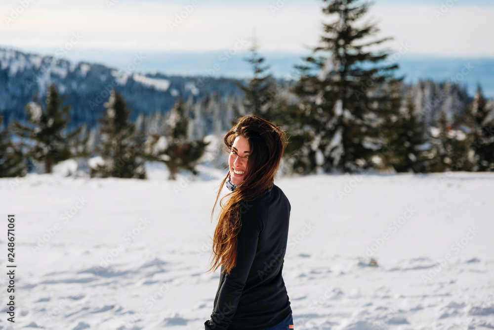 beautiful girl on snow smile in camera beautiful girl on snow smile in camera