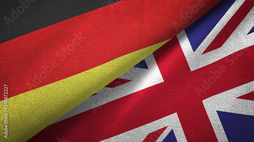 Germany and United Kingdom two flags textile cloth, fabric texture photo