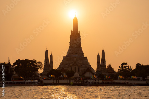 Wat Arun temple during golden hour sunset in Bangkok  Thailand.