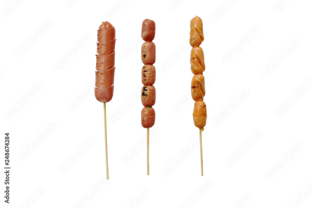 grilled pork and chicken sausage stabbing in wooden stick on white background grilled pork and chicken sausage stabbing in wooden stick on white background