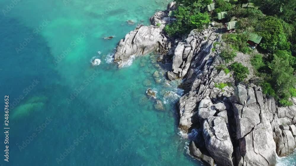 Aerial View of Tropical Island with Sandy and Rocky Sea Shore Aerial View of Tropical Island with Sandy and Rocky Sea Shore