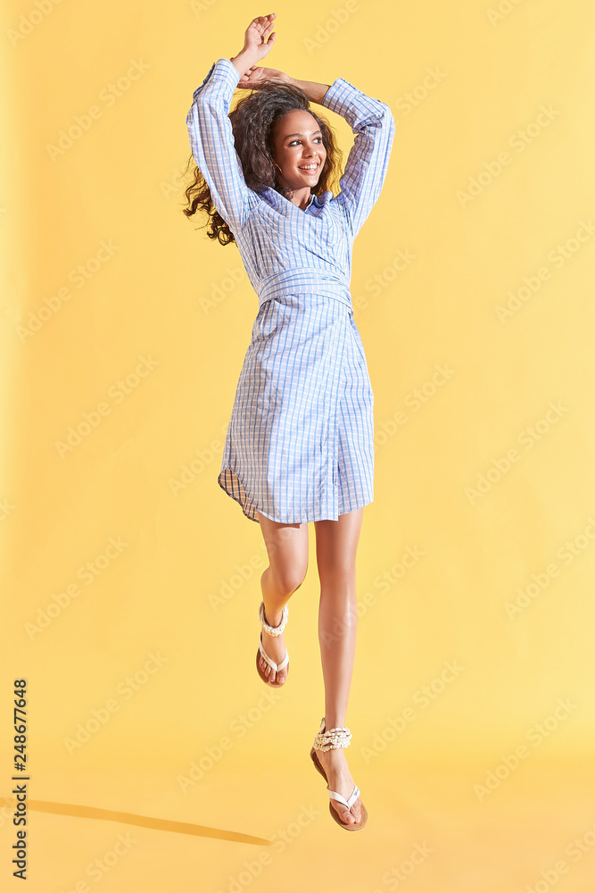 Confident Successful Fitness Female Model Posing And Looking Up. Full Body  Length Portrait Isolated On White Studio Background. Stock Photo, Picture  and Royalty Free Image. Image 87714899.