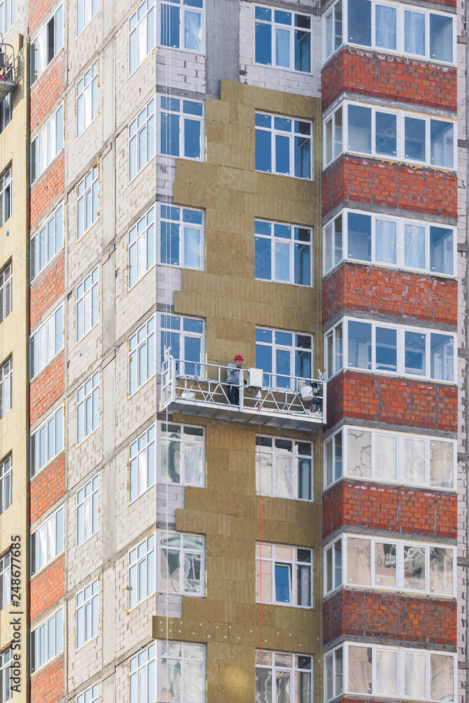 Facade work and insulation of a multistory building