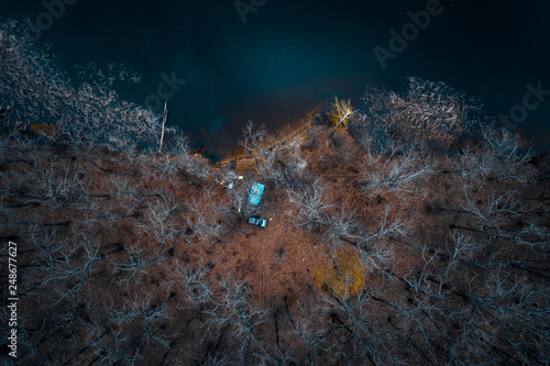 Autumn aerial forest and lake shore © LALSSTOCK
