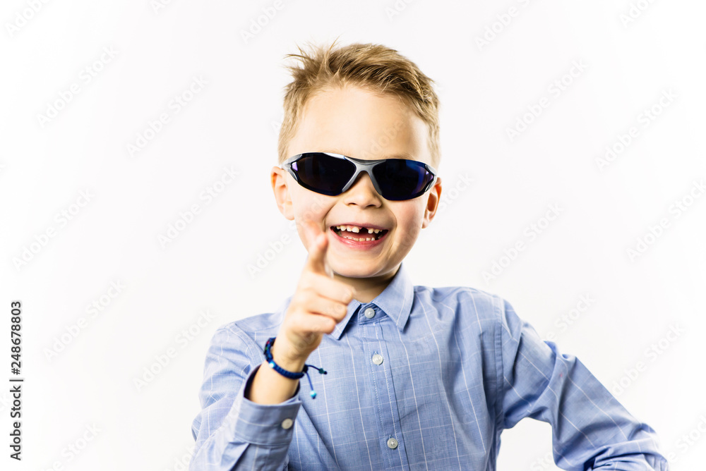 happy boy without a front tooth smiling over white background happy boy without a front tooth smiling over white background