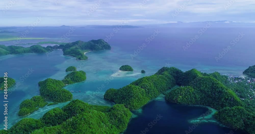 Aerial view flying over the beautiful and tropical green mountains Sugba Lagoon in Siargao, Philippines Aerial view flying over the beautiful and tropical green mountains Sugba Lagoon in Siargao, Philippines