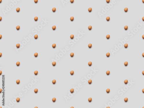 organic brown eggs on grey background, seamless pattern