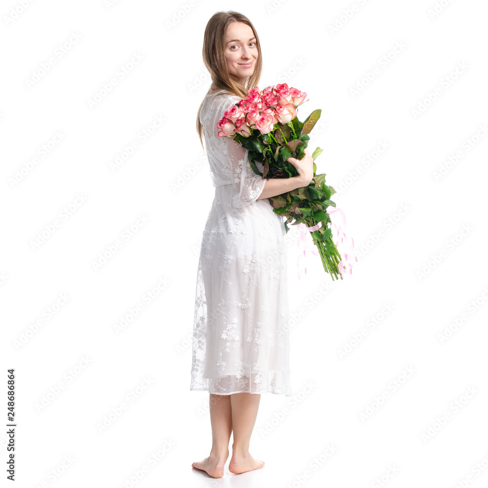 Woman in dress with flowers roses in hand on white background isolation, back view