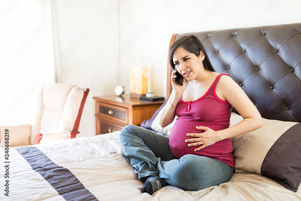 Pregnant Woman Feeling Contractions Calling For Help Pregnant Woman Feeling Contractions Calling For Help