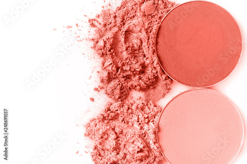 Crushed eye shadow and round eye shadow isolated on the white background