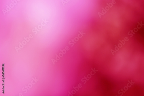 Abstract blurred pink and red color background.
