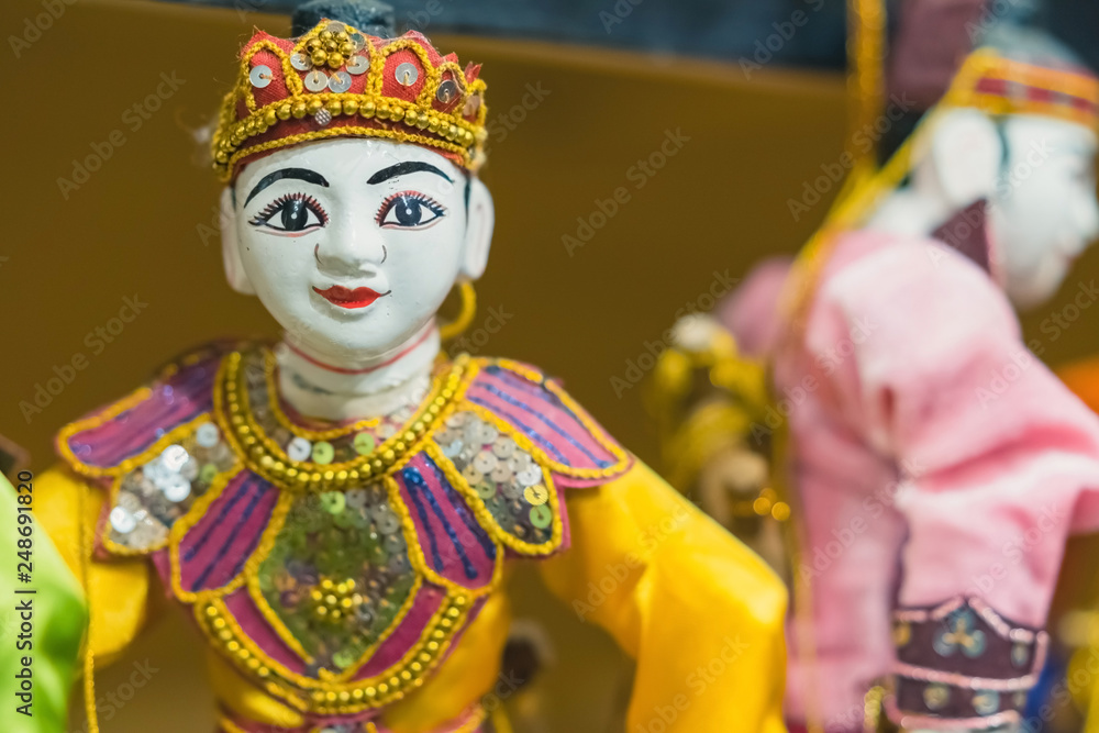Fototapeta premium Traditional handicraft puppets for sale in the ancient pagoda in Bagan, Myanmar