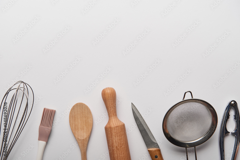 top view of cooking utensils on grey background Stock Photo | Adobe Stock