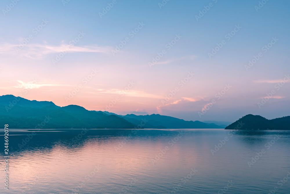 Scenery after sunset of Kwai Yai river at Srinagarind Dam in Kanchanaburi, Thailand