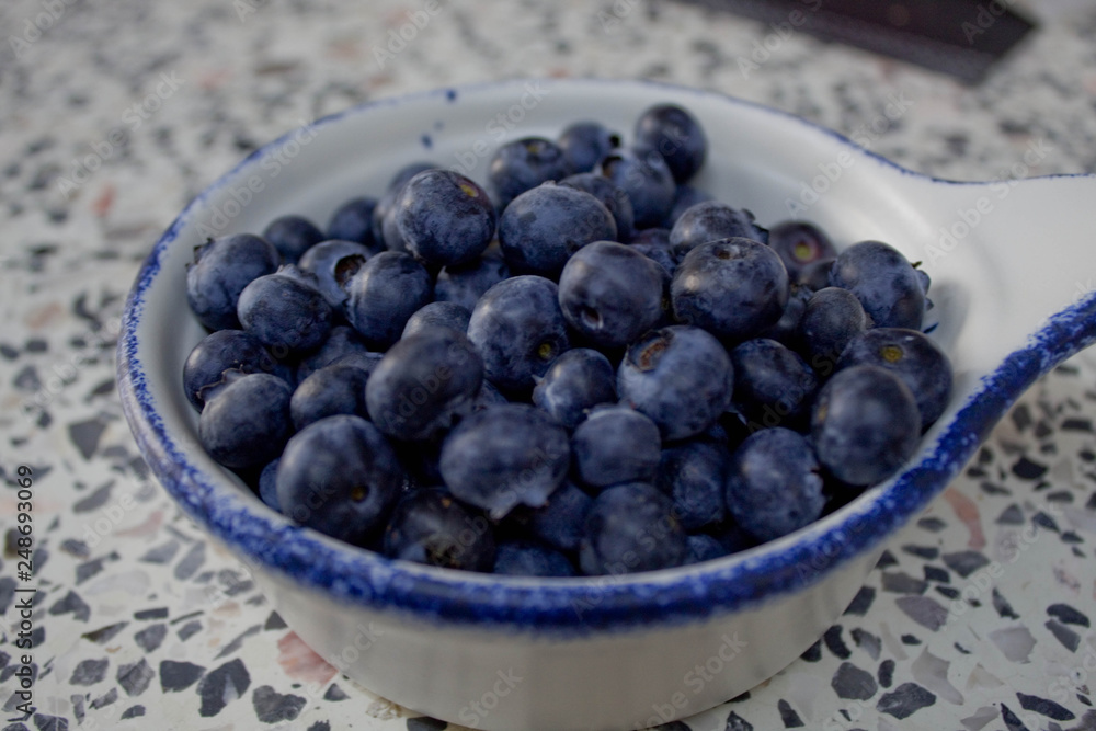 Blueberries in a white plate Blueberries in a white plate